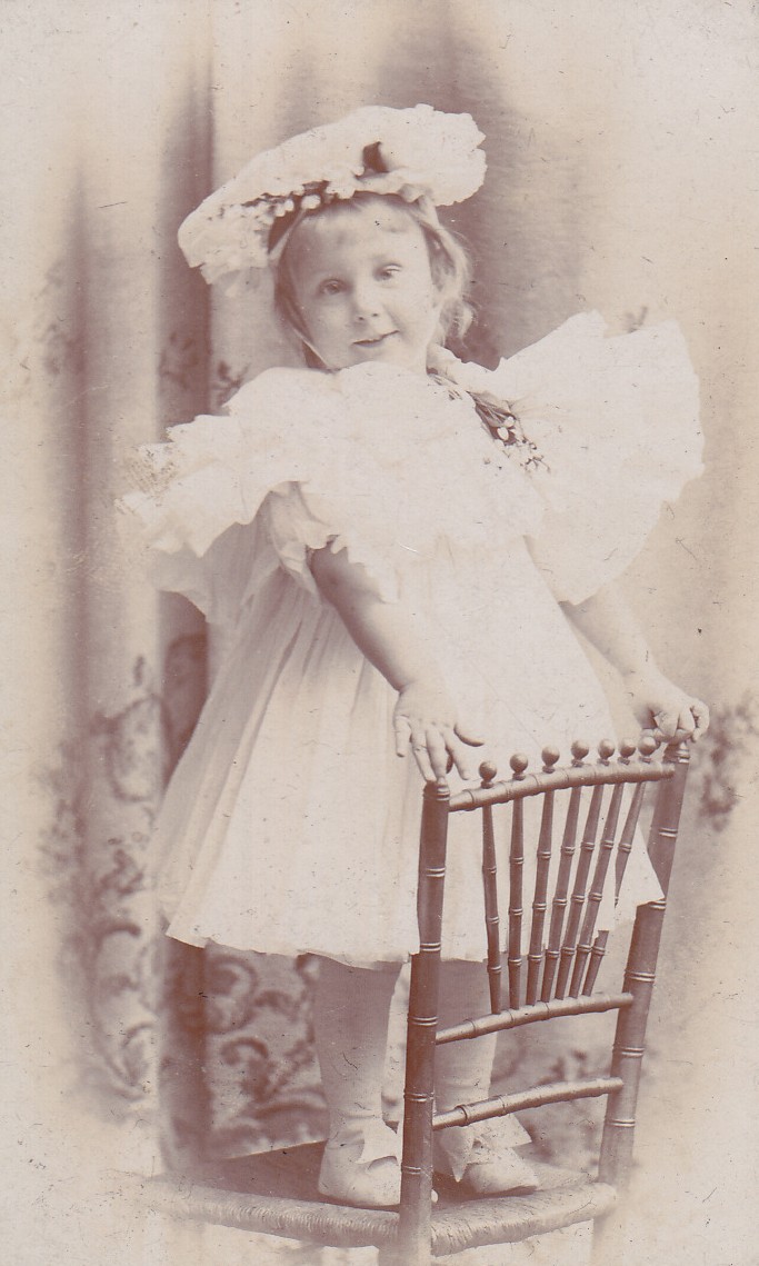 Mildred-young-standing-on-chair