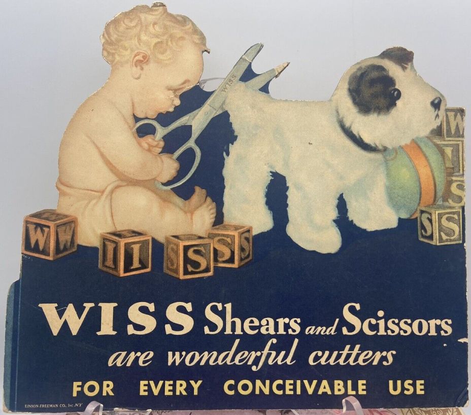 Click image for full-size image (1248 × 1104 pixels). baby cutting dog tail 1