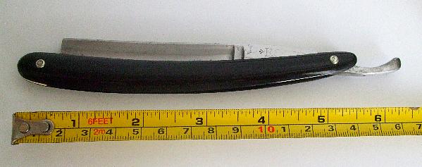 black oval ES..X inscription 1