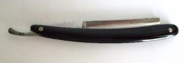 black oval ES..X inscription 2